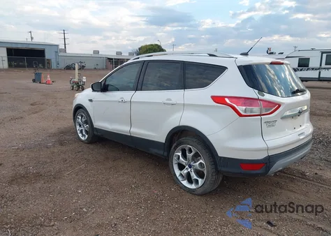 2016 Ford Escape Titanium z USA, uszkodzony, nr VIN 1FMCU0J91GUB06941